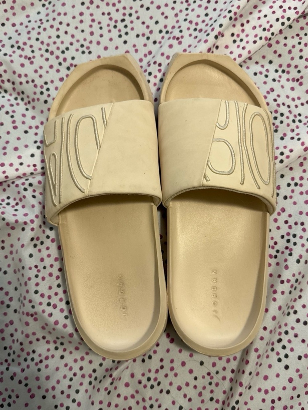 Jordan Cream Slide Sandals with Embossed Detail